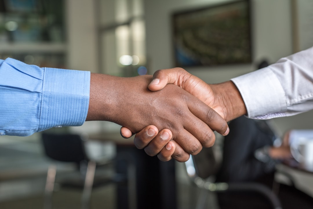 Commercial partners meeting and shaking hands